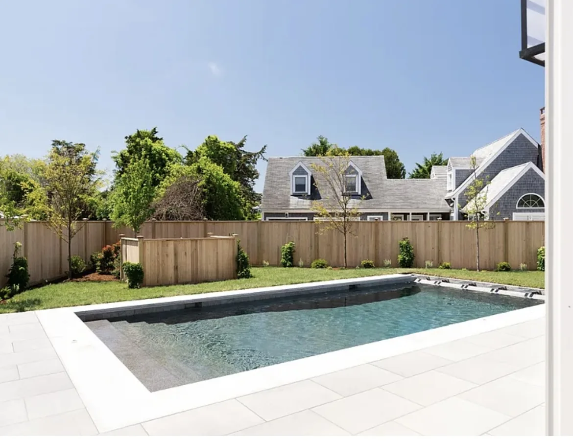 22 Tashama Lane Nantucket poolside before redesign with plain board fence